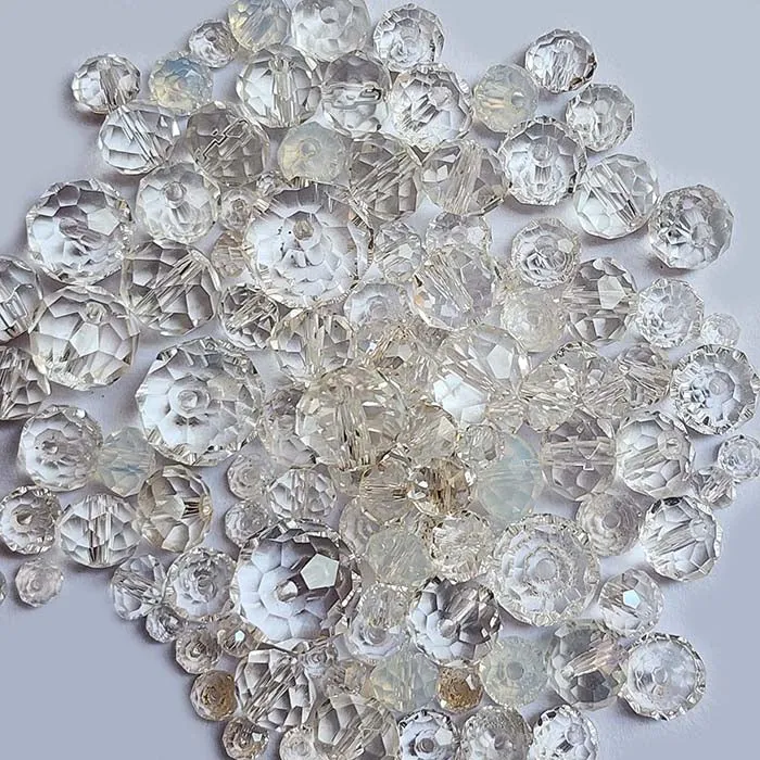 50 Grams Pkg. White color shade, Rondelle Faceted Crystal Mix size glass beads Size mostly encluded as 6mm, 8mm, 10mm, to some extent 4mm and 12mm mixed